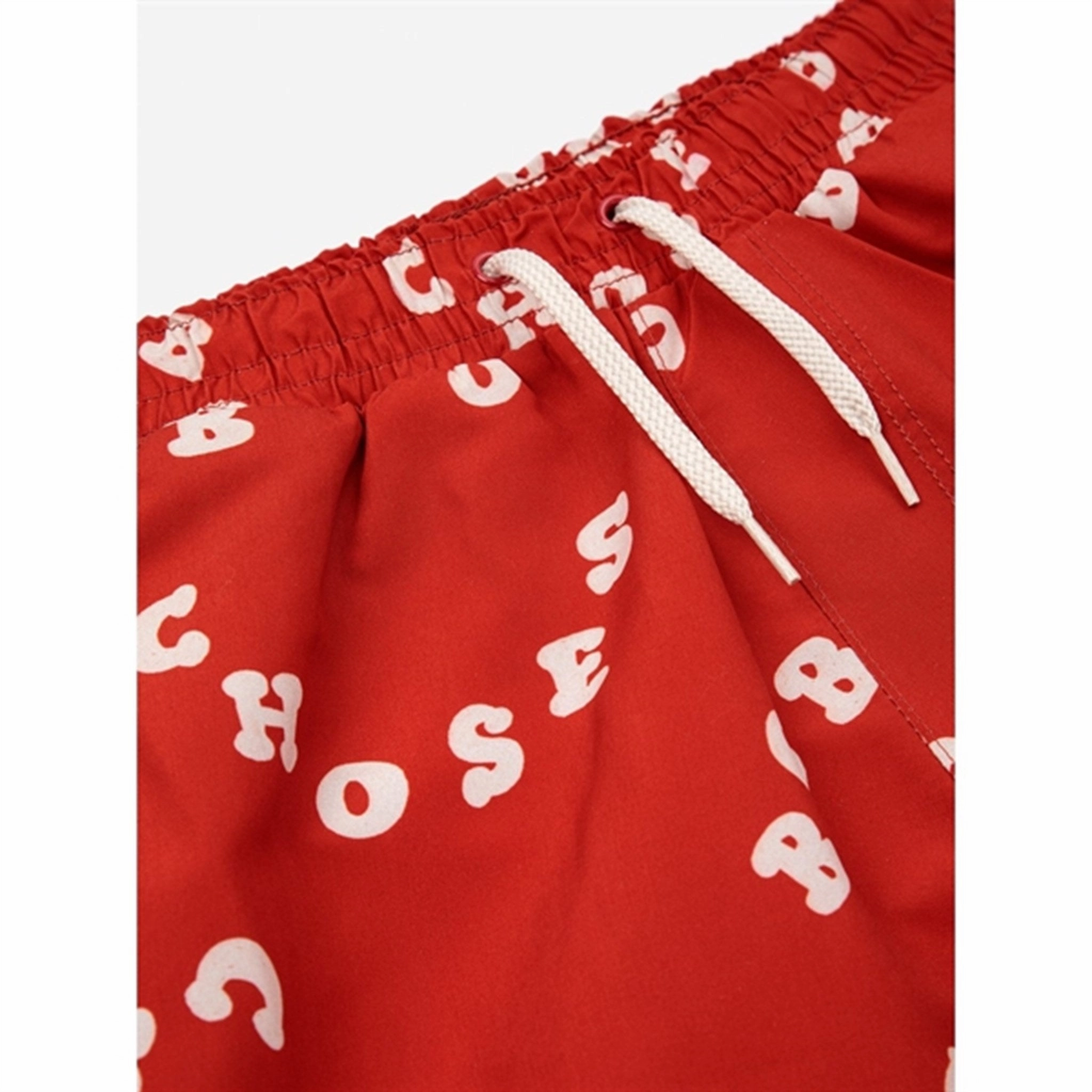 Bobo Choses Circle All Over Swim Bermuda Shorts Red Laser Cut Perforations