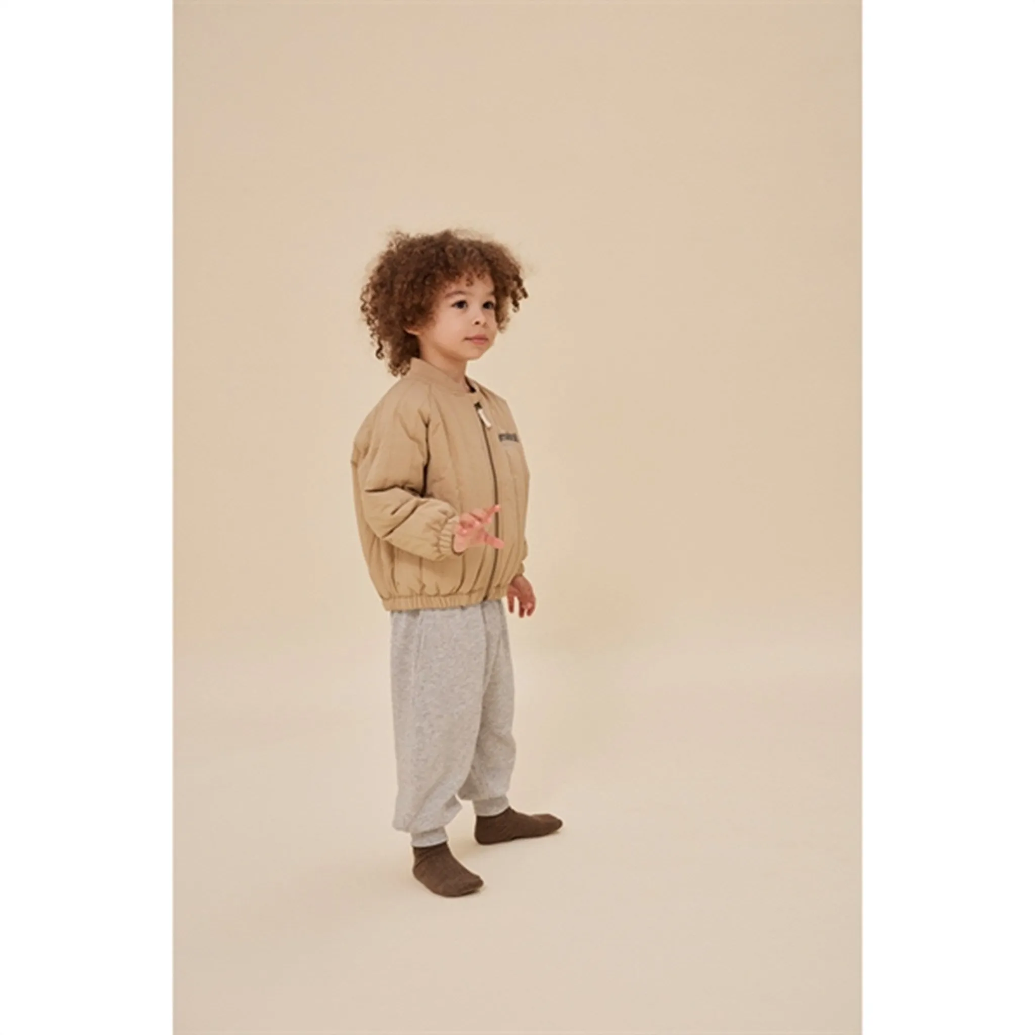 Versatile button-down blouse Heritage-Brand Konges Sl?jd Juno Bomber Thermo Jacket Travertine