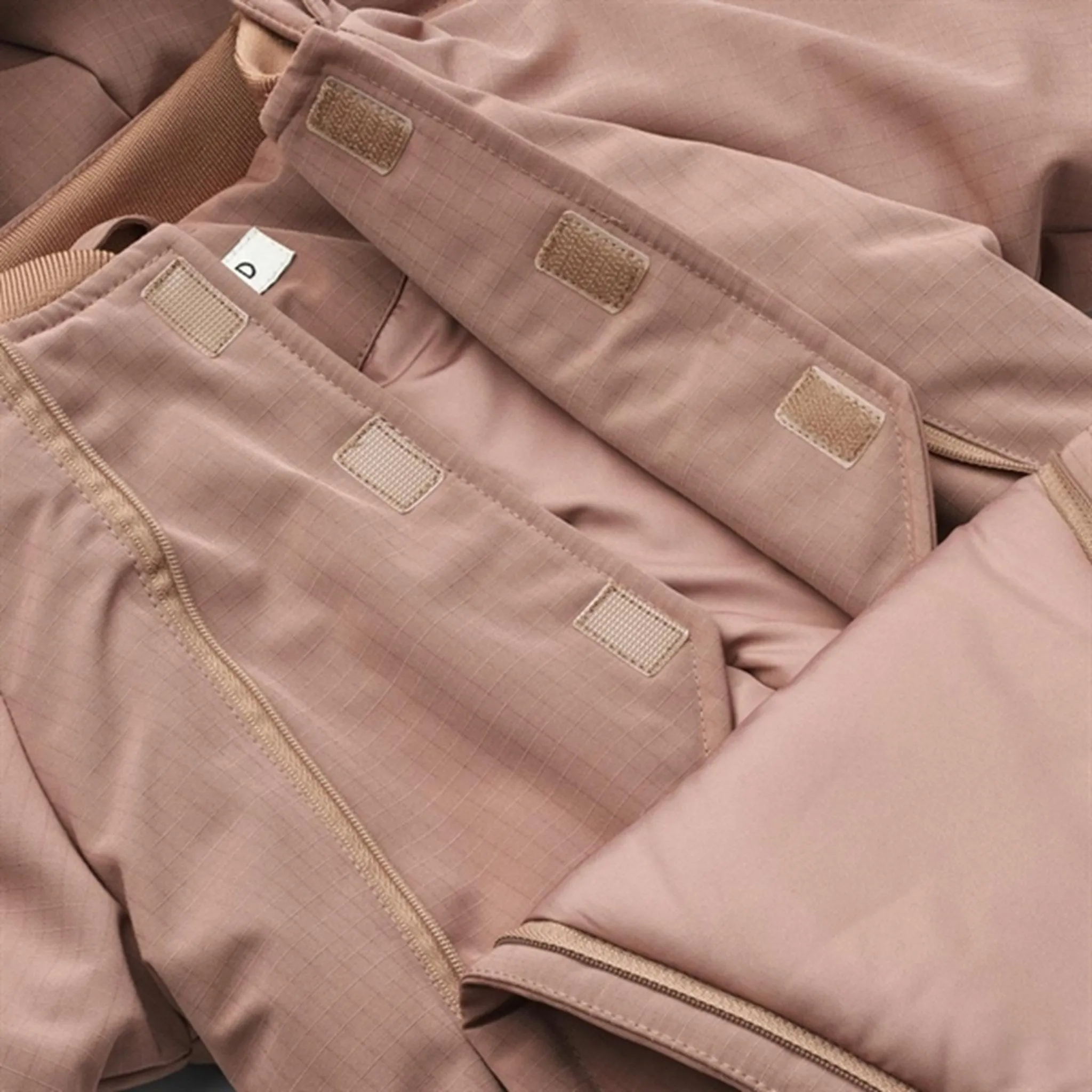 Stylish all-day shirt Liewood Lin Baby Snnowsuit Dark Rosetta