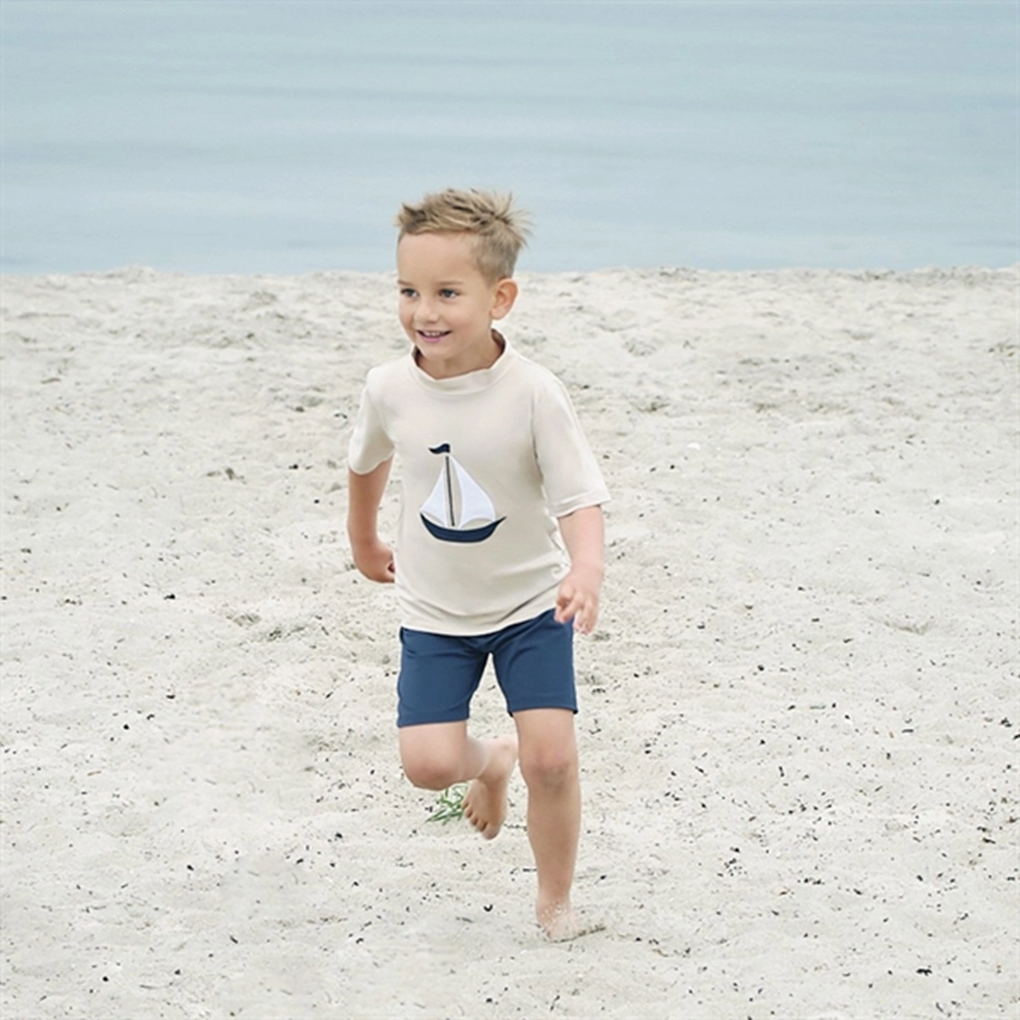 Petit Crabe Latte Ash Swim Shirt Coastal-Charm Tropical Relaxation