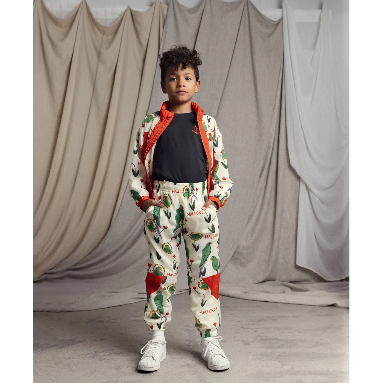 Mini Rodini Multi Parrots AOP Nylon Tracksuit Jacket Socks suitable for product launches